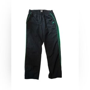 Nike Men's Black Joggers with Green Stripes